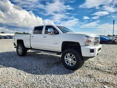 Czwarte zdjęcie samochodu z boku: 2016 CHEVROLET SILVERADO K2500 HIGH COUNTRY VIN:1GC1KXE83GF120937 - miniatura