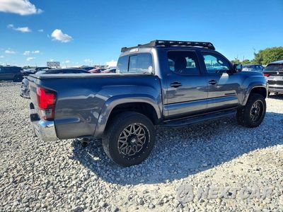 Trzecie zdjęcie samochodu z tyłu: 2020 TOYOTA TACOMA SR5 V6 VIN:3TMAZ5CN4LM119265 - miniatura