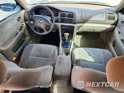 Zdjęcie 8 z 13 samochodu: 2000 MAZDA 626 ES VIN:1YVGF22C3Y5169387 - miniatura