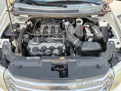 Zdjęcie 12 z 13 samochodu: 2009 FORD TAURUS X SEL VIN:1FMDK02W29GA06248 - miniatura
