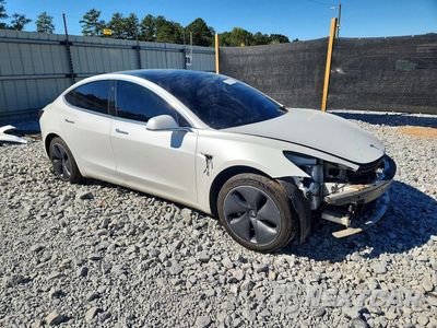 Czwarte zdjęcie samochodu z boku: 2019 TESLA MODEL 3 VIN:5YJ3E1EA9KF509403 - miniatura