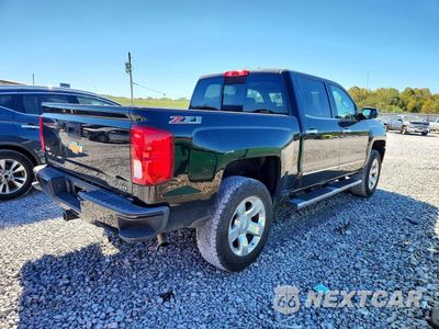 Trzecie zdjęcie samochodu z tyłu: 2017 CHEVROLET SILVERADO K1500 LTZ VIN:3GCUKSEC1HG210088 - miniatura