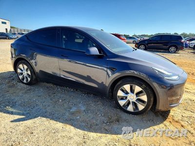 Czwarte zdjęcie samochodu z boku: 2021 TESLA MODEL Y VIN:5YJYGDEE1MF090793 - miniatura