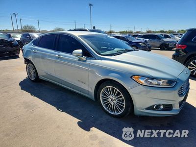 Czwarte zdjęcie samochodu z boku: 2014 FORD FUSION SE HYBRID VIN:3FA6P0LU0ER157156 - miniatura
