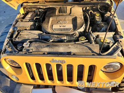 Zdjęcie 12 z 13 samochodu: 2014 JEEP WRANGLER UNLIMITED SAHARA VIN:1C4BJWEG5EL110854 - miniatura
