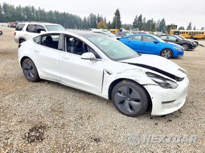 Czwarte zdjęcie samochodu z boku: 2020 TESLA MODEL 3 VIN:5YJ3E1EA7LF740012 - miniatura