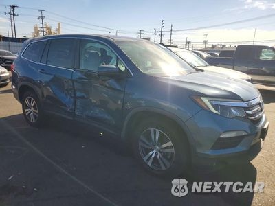 Czwarte zdjęcie samochodu z boku: 2018 HONDA PILOT EX VIN:5FNYF5H3XJB000216 - miniatura