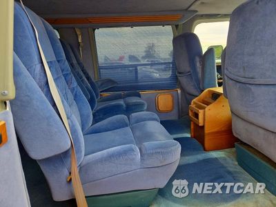 Zdjęcie 11 z 13 samochodu: 1994 CHEVROLET G20 VIN:1GBEG25K8RF183850 - miniatura