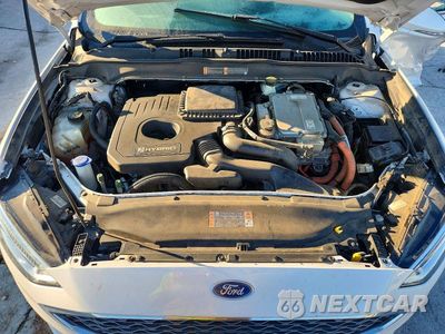 Zdjęcie 11 z 13 samochodu: 2017 FORD FUSION TITANIUM HEV VIN:3FA6P0RU8HR161533 - miniatura