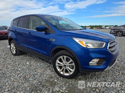 Czwarte zdjęcie samochodu z boku: 2017 FORD ESCAPE SE VIN:1FMCU9GD4HUE70658 - miniatura