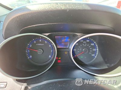 Zdjęcie 9 z 13 samochodu: 2013 HYUNDAI TUCSON GLS VIN:KM8JUCAC5DU662962 - miniatura