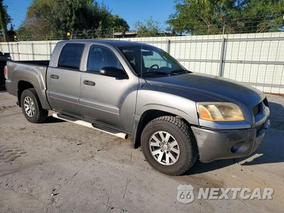 Czwarte zdjęcie samochodu z boku: 2007 MITSUBISHI RAIDER LS VIN:1Z7HC28K67S110680 - miniatura