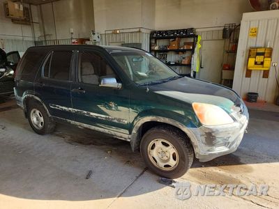 Czwarte zdjęcie samochodu z boku: 2003 HONDA CR-V LX VIN:JHLRD68443C006251 - miniatura