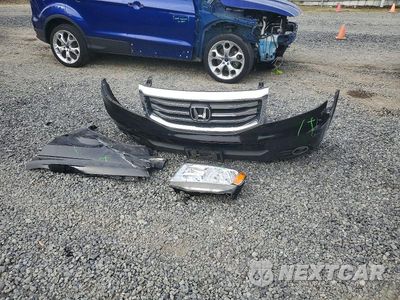 Zdjęcie 13 z 14 samochodu: 2014 HONDA PILOT TOURING VIN:5FNYF4H90EB048909 - miniatura