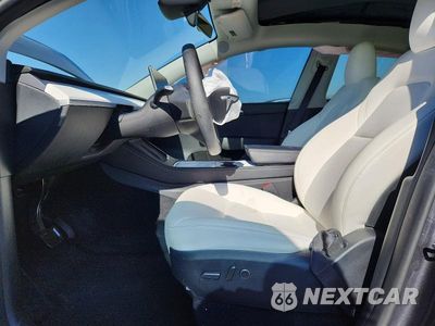 Zdjęcie 7 z 13 samochodu: 2023 TESLA MODEL Y VIN:7SAYGDED3PF940289 - miniatura