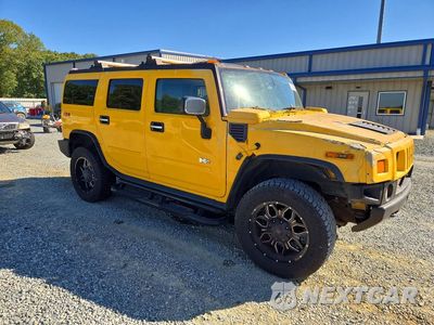 Czwarte zdjęcie samochodu z boku: 2003 HUMMER H2 VIN:5GRGN23U33H107431 - miniatura