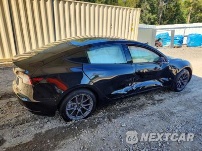 Trzecie zdjęcie samochodu z tyłu: 2018 TESLA MODEL 3 VIN:5YJ3E1EA4JF070299 - miniatura