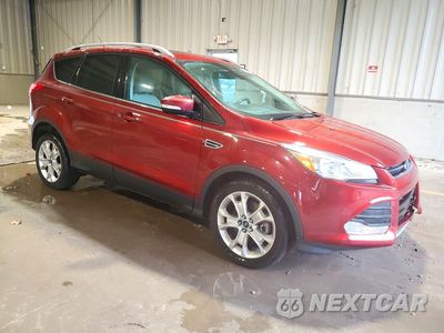 Czwarte zdjęcie samochodu z boku: 2016 FORD ESCAPE TITANIUM VIN:1FMCU9J94GUC86727 - miniatura
