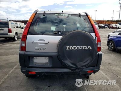Zdjęcie 6 z 12 samochodu: 2004 HONDA CR-V LX VIN:JHLRD68454C010228 - miniatura