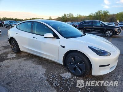 Czwarte zdjęcie samochodu z boku: 2022 TESLA MODEL 3 VIN:5YJ3E1EB7NF240749 - miniatura
