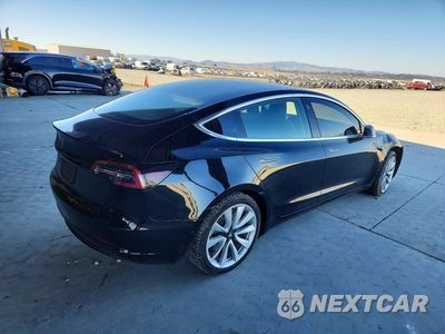 Trzecie zdjęcie samochodu z tyłu: 2018 TESLA MODEL 3 VIN:5YJ3E1EA6JF136383 - miniatura