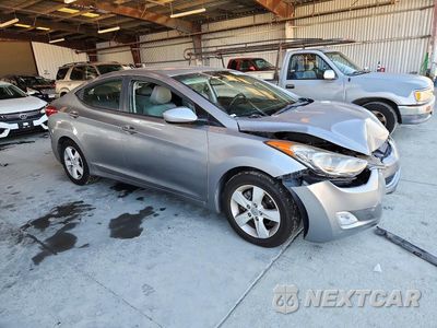 Czwarte zdjęcie samochodu z boku: 2012 HYUNDAI ELANTRA GLS VIN:KMHDH4AE8CU356054 - miniatura