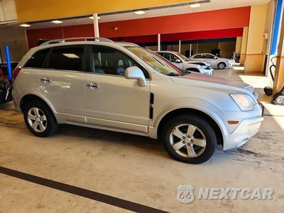 Czwarte zdjęcie samochodu z boku: 2012 CHEVROLET CAPTIVA SPORT VIN:3GNFL4E5XCS640315 - miniatura