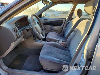 Zdjęcie 7 z 12 samochodu: 2001 TOYOTA COROLLA CE VIN:1NXBR12E51Z482239 - miniatura
