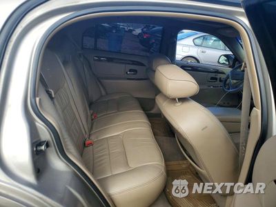 Zdjęcie 10 z 13 samochodu: 2001 LINCOLN TOWN CAR SIGNATURE VIN:1LNHM82W01Y620885 - miniatura