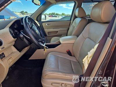Zdjęcie 7 z 13 samochodu: 2012 HONDA PILOT TOURING VIN:5FNYF4H96CB055134 - miniatura