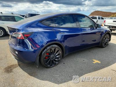 Trzecie zdjęcie samochodu z tyłu: 2022 TESLA MODEL Y VIN:7SAYGDEFXNF309778 - miniatura