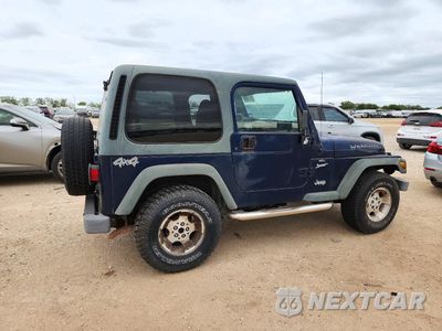 Trzecie zdjęcie samochodu z tyłu: 2000 JEEP WRANGLER / TJ SPORT VIN:1J4FA49S5YP745357 - miniatura