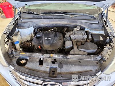 Zdjęcie 12 z 14 samochodu: 2013 HYUNDAI SANTA FE SPORT 2.4L VIN:5XYZT3LB8DG078006 - miniatura