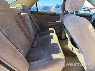 Zdjęcie 10 z 12 samochodu: 2004 TOYOTA CAMRY LE VIN:JTDBE32K240301529 - miniatura