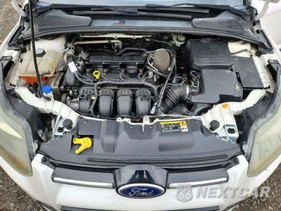 Zdjęcie 11 z 12 samochodu: 2013 FORD FOCUS TITANIUM VIN:1FADP3J20DL259936 - miniatura