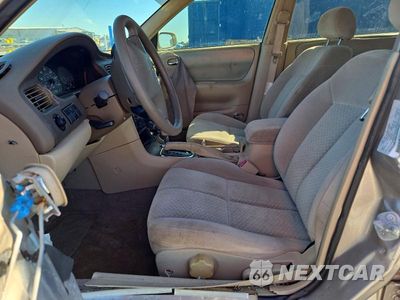 Zdjęcie 7 z 12 samochodu: 2002 MAZDA 626 LX VIN:1YVGF22C025302565 - miniatura