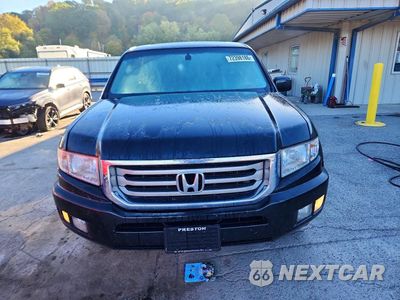 Piąte zdjęcie samochodu w środku: 2011 HONDA RIDGELINE RTL VIN:5FPYK1F51BB452640 - miniatura