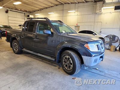 Czwarte zdjęcie samochodu z boku: 2015 NISSAN FRONTIER PRO-4X VIN:1N6AD0EV4FN703980 - miniatura