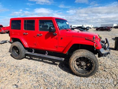 Czwarte zdjęcie samochodu z boku: 2014 JEEP WRANGLER UNLIMITED RUBICON VIN:1C4BJWFG7EL325828 - miniatura