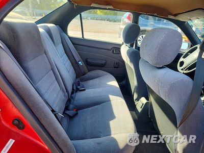 Zdjęcie 10 z 12 samochodu: 1994 TOYOTA COROLLA DX VIN:1NXAE09BXRZ119394 - miniatura