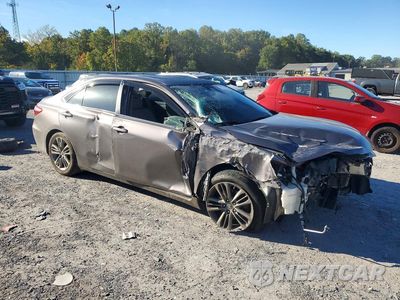 Czwarte zdjęcie samochodu z boku: 2016 TOYOTA CAMRY HYBRID SE VIN:4T1BD1FK4GU191089 - miniatura