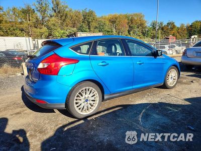 Trzecie zdjęcie samochodu z tyłu: 2014 FORD FOCUS TITANIUM VIN:1FADP3N22EL338603 - miniatura