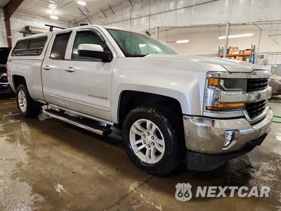 Czwarte zdjęcie samochodu z boku: 2019 CHEVROLET SILVERADO LD K1500 LT VIN:2GCVKPEC7K1137360 - miniatura