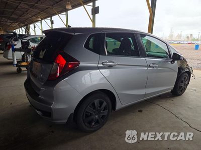 Trzecie zdjęcie samochodu z tyłu: 2020 HONDA FIT LX VIN:3HGGK5H48LM708500 - miniatura