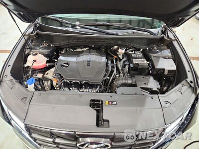 Zdjęcie 12 z 13 samochodu: 2024 HYUNDAI TUCSON SEL VIN:5NMJFCDE8RH366411 - miniatura