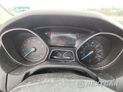 Zdjęcie 9 z 12 samochodu: 2014 FORD FOCUS TITANIUM VIN:1FADP3J24EL215133 - miniatura