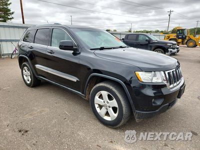 Czwarte zdjęcie samochodu z boku: 2012 JEEP GRAND CHEROKEE LAREDO VIN:1C4RJFAG3CC145376 - miniatura