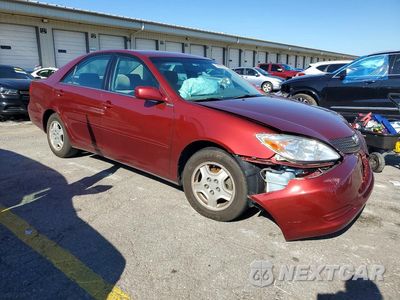 Czwarte zdjęcie samochodu z boku: 2002 TOYOTA CAMRY LE V6 VIN:4T1BF32KX2U001977 - miniatura