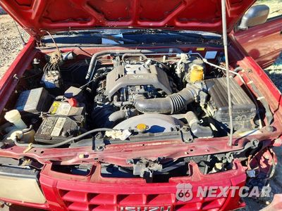 Zdjęcie 12 z 13 samochodu: 1998 ISUZU RODEO S VIN:4S2CM58W8W4344866 - miniatura