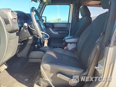 Zdjęcie 7 z 12 samochodu: 2016 JEEP WRANGLER SPORT VIN:1C4AJWAG9GL135888 - miniatura